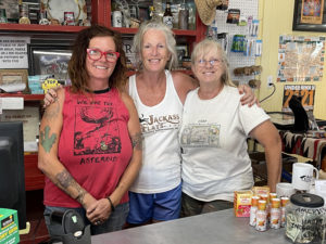 Anni McReynolds (left), Pam Gordon, and Dian Hurd inside the Little Burro Country Store